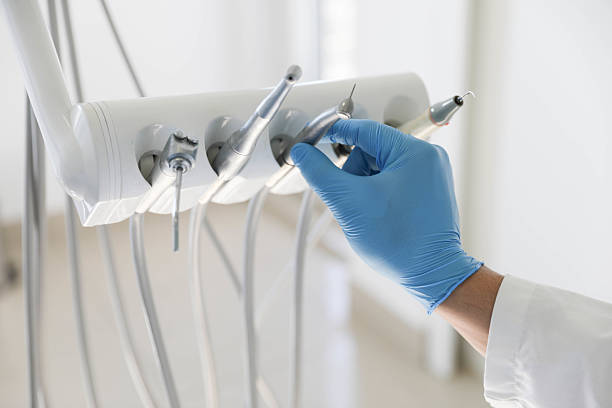 Professional Tooth Extraction technician working in Catahoula, LA